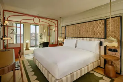 an overhead view of a living room with a staircase at Origine Porto Gaia, a Tribute Portfolio Hotel in Vila Nova de Gaia