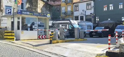 a car is parked at a gas station at Classic Charm of an Old Porto free parking in Vila Nova de Gaia