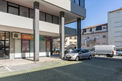 a car parked in front of a building at Yellow Breeze Apartment by Cozy Stay in Porto