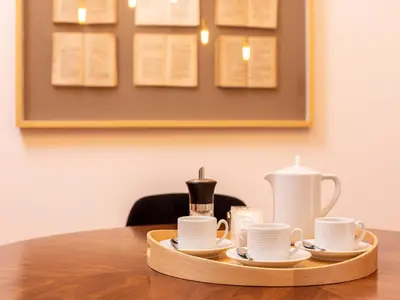 a tray with cups and cups on a table at 2 Bedroom Apartment in Oporto in Porto