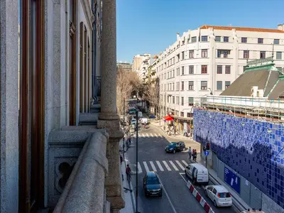 a view of a city street with cars and buildings at Cosy apartment in heart of Porto in Porto