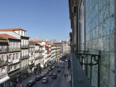 a view of a city street with cars and buildings at Studio with balcony in Oporto in Porto