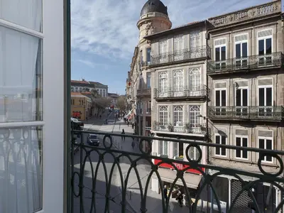 a view of a city street from a window at Studio with balcony in Oporto in Porto