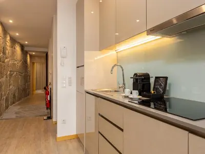 a kitchen with a sink and a counter top at Apartment in Vila Nova de Gaia in Vila Nova de Gaia