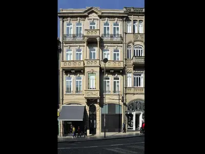a large building on the side of a street at Beautiful apartment in Oporto in Porto