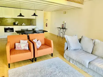 a village on a cliff next to the ocean at Trendy Studio in the Heart of Porto in Porto