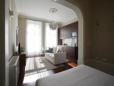 a room with a bed and a living room at Cozy 1-bedroom apartment in Porto in Porto