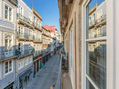 a view from a window of an alley between buildings at Apartment in Porto with balcony in Porto