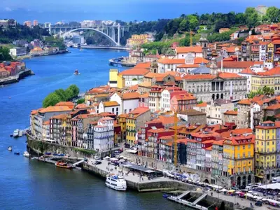 a view of a city with a river and buildings at 1-bedroom apartment in Porto's heart in Porto