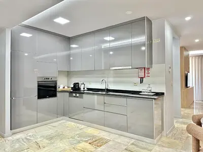 a kitchen with stainless steel cabinets and a sink at Charming Modern Studio in Porto in Porto