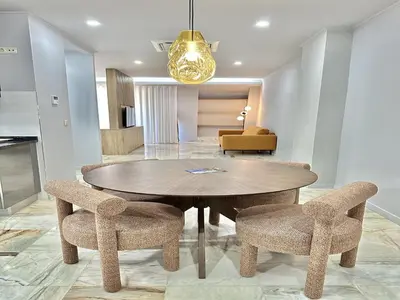 a dining room with a table and two chairs at Charming Modern Studio in Porto in Porto