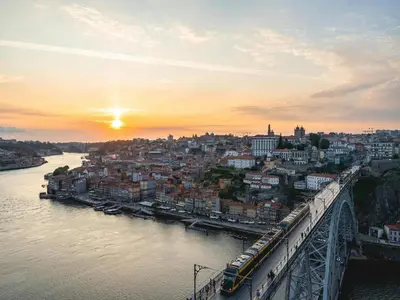 a view of a city with a bridge and a river at Charming urban apartment in Porto's heart in Porto