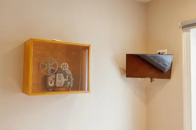 a picture of a clock on a wall at Boutique Suites by Hosty in Porto