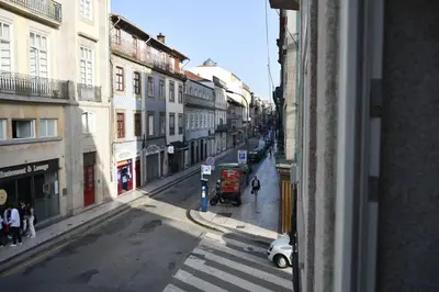 a view from a window of a city street at Central and comfortable apartment -downtown in Porto
