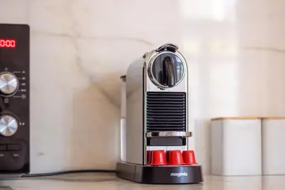 a toaster sitting on top of a counter at Bright Flat few steps to Aliados Av by LovelyStay in Porto