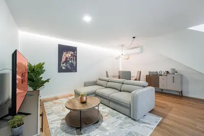 a living room with a couch and a table at GuestReady - Vera Cruz Apartments in Porto