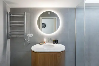 a bathroom with a sink and a mirror at GuestReady - Vera Cruz Apartments in Porto