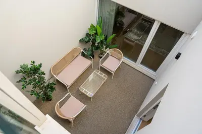 a group of chairs sitting on a balcony at GuestReady - Vera Cruz Apartments in Porto