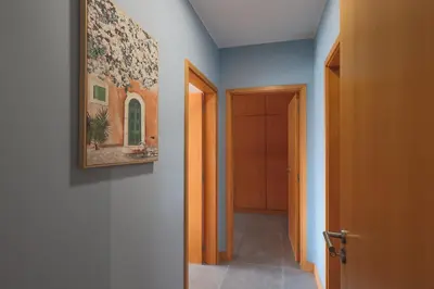a hallway with a painting on the wall at Porto Cathedral III in Porto
