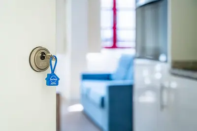 a door with a key in a room at Close to Everything Your Oporto Blue PRM 2F in Porto
