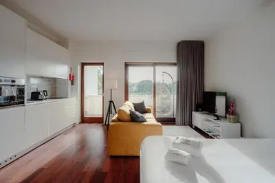 a display of a website on a bed at Almada 516 by Best2Stay in Porto