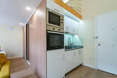 a bathroom with a sink and a shower at Close to Everything Your Oporto Yellow PRM 1F in Porto