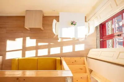 a living room with a couch and a table at Close to Everything Your Oporto Yellow PRM 1F in Porto