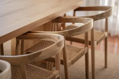 a wooden table with chairs around a wooden table at Feel Porto Ribeira Vintage Duplex in Porto