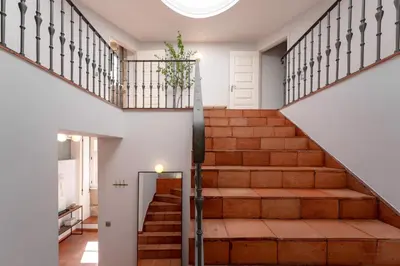 a staircase in a house with a stair case at Feel Porto Ribeira Vintage Duplex in Porto