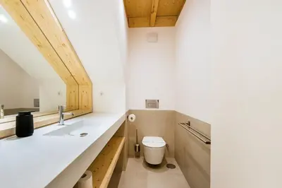 a bathroom with a sink and a toilet at GuestReady - Cedofeita Collection Apartments in Porto