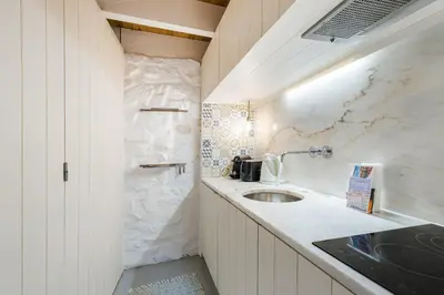 a bathroom with a sink and a counter top at GuestReady - A special place in Porto in Porto