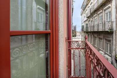a view out of a window of a balcony at GuestReady - Clérigos Tiles House in Porto