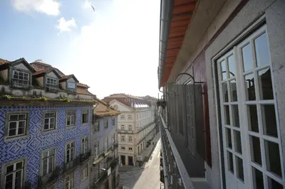 a view of an alley from an open window at My Ribeira Guest House in Porto