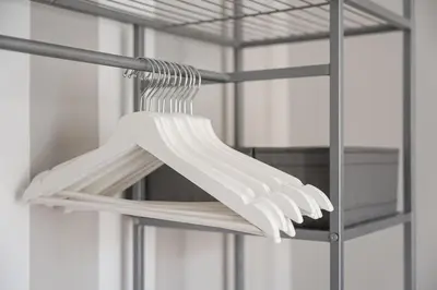 a rack with white utensils in a kitchen at GuestReady - Peaceful retreat near Casa da Música in Porto