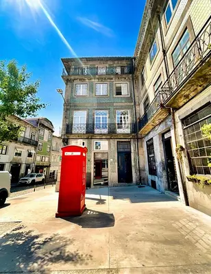 a figurine of a woman on a shelf next to a mirror at Oporto Blue Miragaia - Central Apartment With Charm in Porto