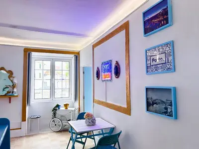 a sign on a wall that reads otato blue miracles at Oporto Blue Miragaia - Central Apartment With Charm in Porto