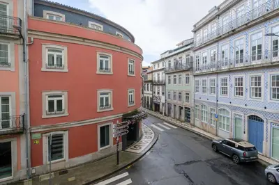 an empty street in a city with buildings at Art Deco 41 Luxury Apartment Downtown Metro AC in Porto