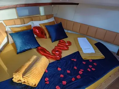 a living room with a couch and a table at SLEEPBOAT Golden Life in Porto