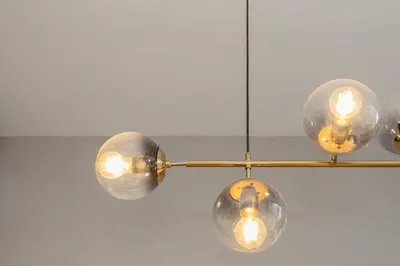 a chandelier with six lights hanging from a ceiling at Liiiving in Porto - Crystal Luxury Apartment in Porto