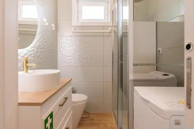 a bathroom with a sink and a toilet at HostWise - Quinta do Vintém w/ Terrace near WOW in Vila Nova de Gaia