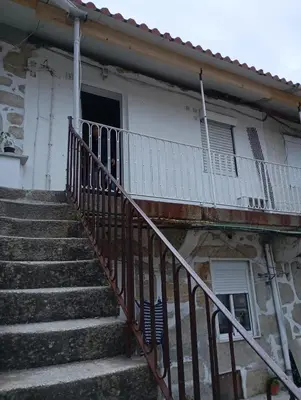 a set of stairs leading to a building with a door at Original Porto - Cedofeita in Porto