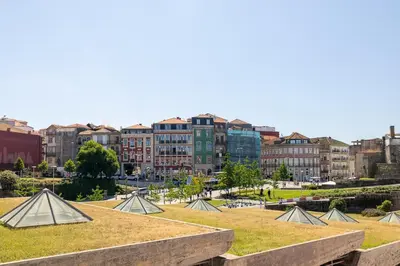 a view of a park with buildings in the background at Central charming flat SÉ by casaporto207 in Porto