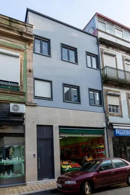 a building with a car parked in front of it at Porto Luxury II in Porto