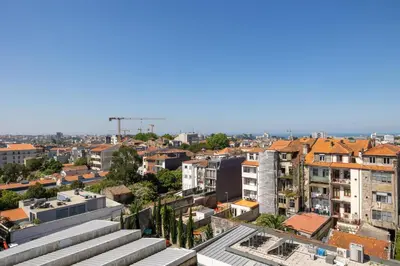 a view of the city from the roof of a building at Skyline Porto Apartment - Porto Velho Apt in Porto