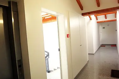 an empty hallway with an open door in a building at PORTO SWEETHEART - Ricardo Jorge in Porto