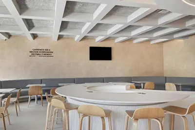 a conference room with a white table and chairs at B&B HOTEL Porto Centro Massarelos in Porto
