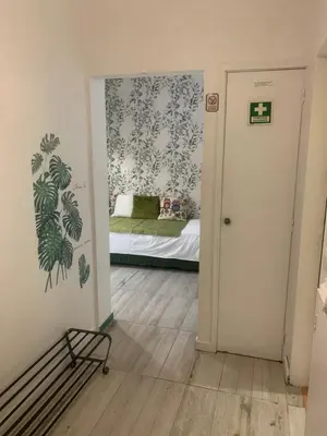 a room with a bedroom with a bed in it at Apartamento Fontinha in Porto