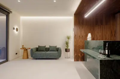 a living room with a couch and a table at Porto River Soul Hotel in Vila Nova de Gaia