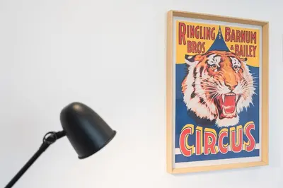 a poster of a tiger with its mouth open at GuestReady - Vereda Downtown Apartments in Porto