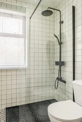 a bathroom with a shower and a toilet at NEW! Gaia Arrabida in Vila Nova de Gaia